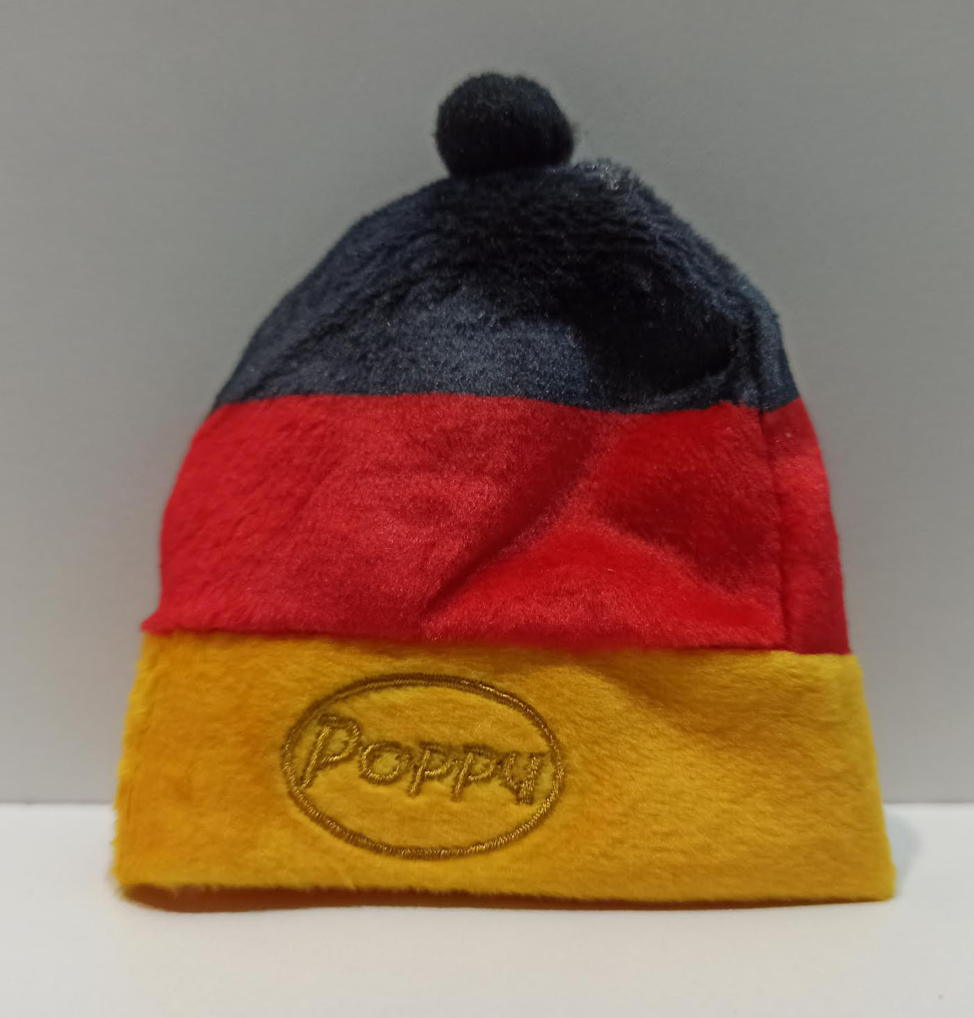 Čepice Poppy – Německo